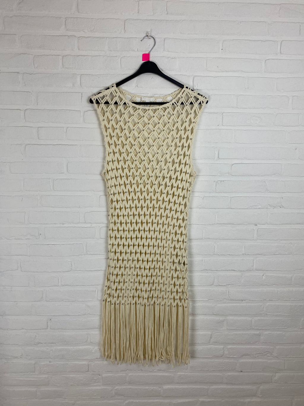 Jurk cream met zilver kleurige kralen
