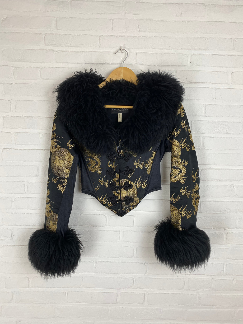 Jas met kraak en corset
