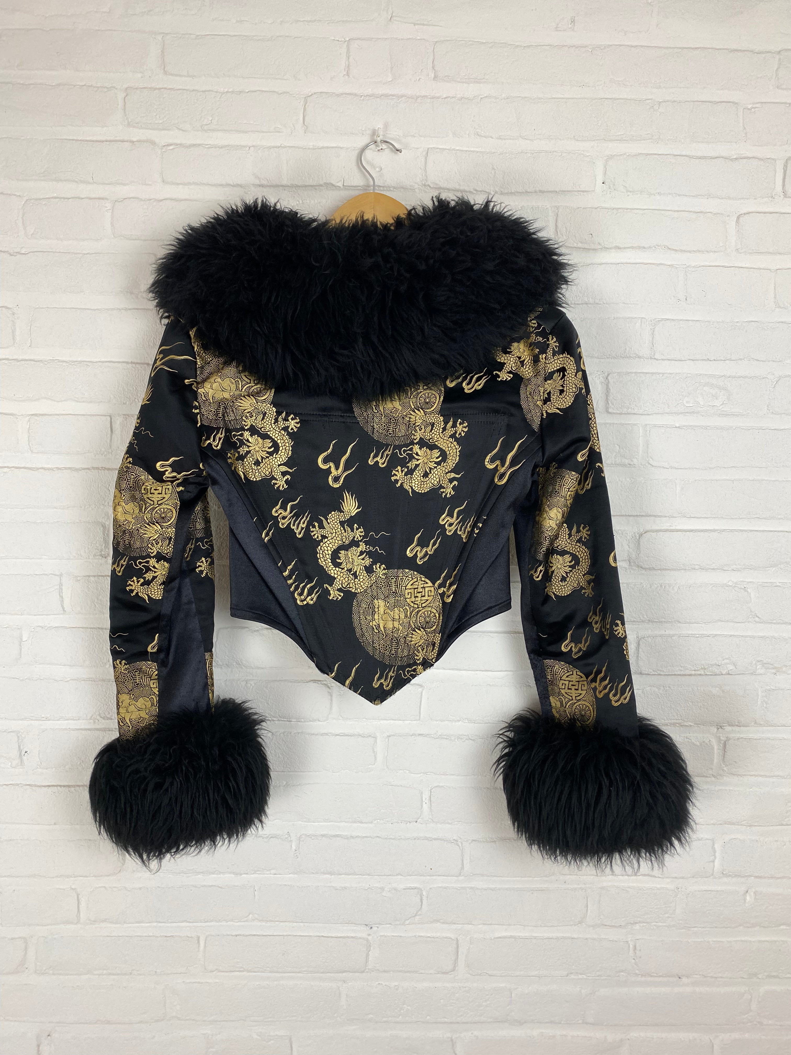 Jas met kraak en corset