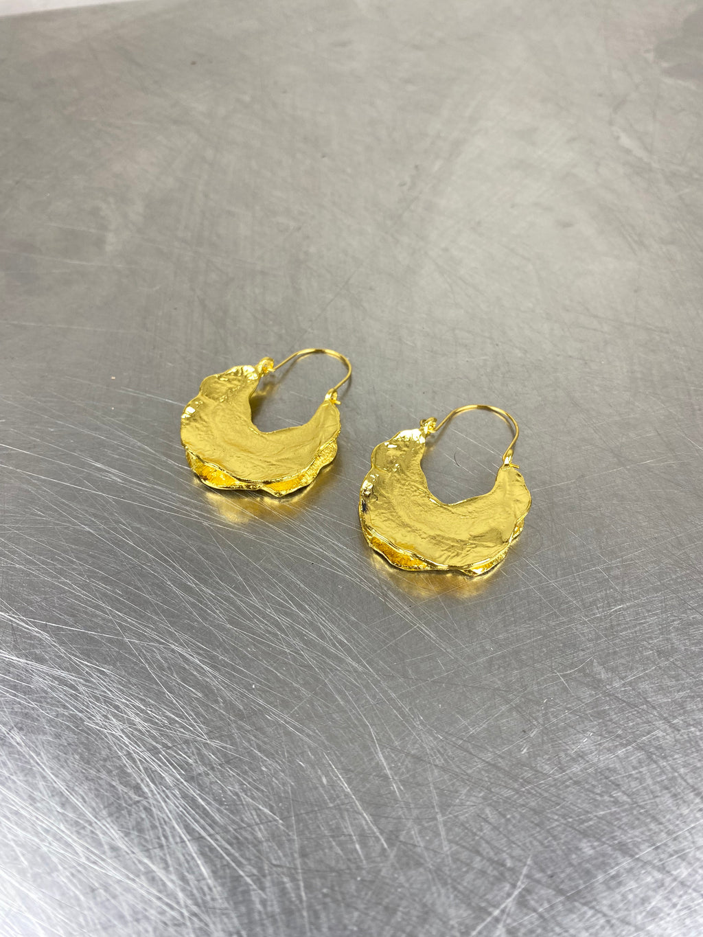 Goud kleurige oorbellen