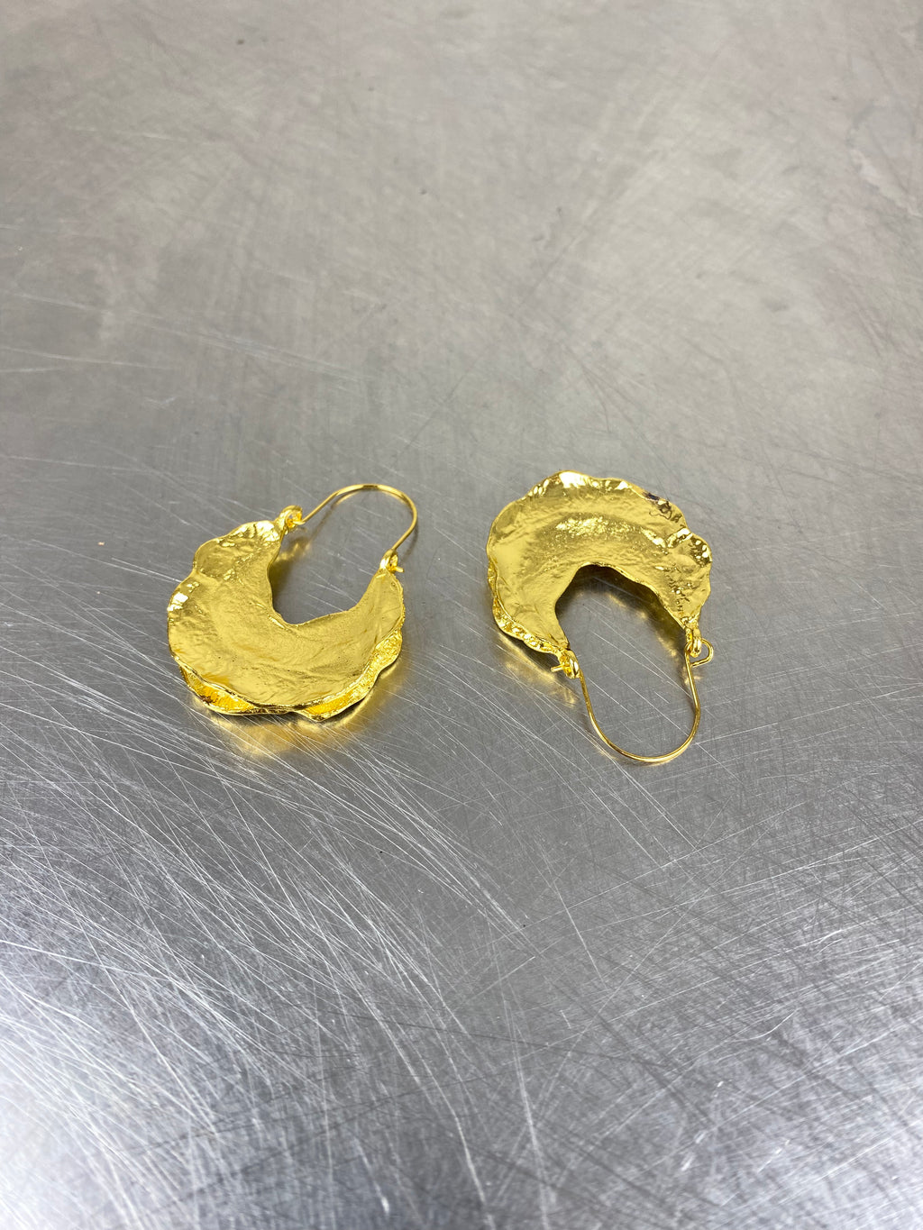 Goud kleurige oorbellen