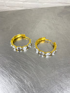 Hoop oorbellen met stenen